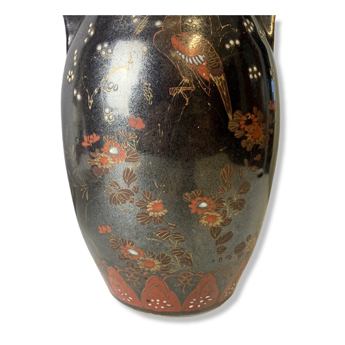 174 - A pair of large hand painted Japanese pottery vases.
28cm Tall