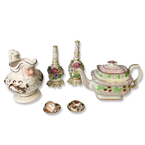 135 - A collection of 19th-century English porcelain. Including a pair of Coalbrookdale vinaigrettes, Lust... 