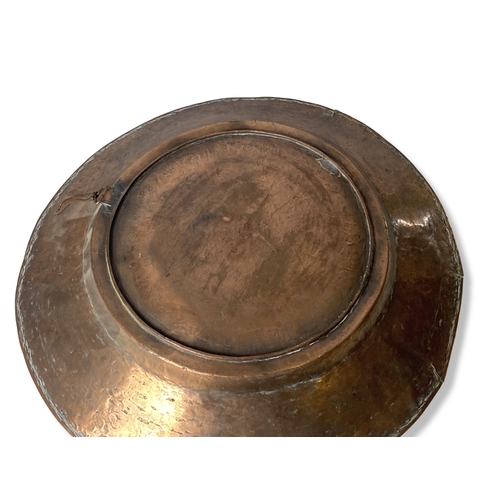 155 - A large engraved Arabic Copper tray / wall plaque.
47cm Diameter