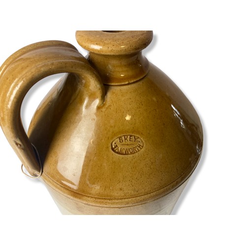 147 - A Skey Tamworth stoneware Flagon.
33cm Tall