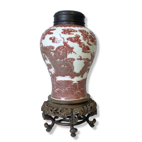 210A - A Chinese Copper Iron-red porcelain Vase. Painted Five-claw Dragons chasing a pearl amongst clouds, ... 