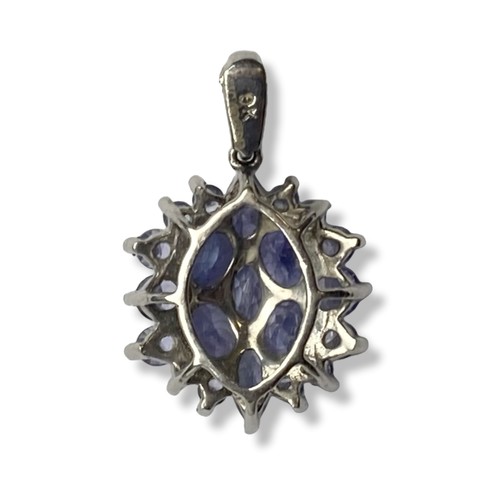 13 - A 9 Carat white Gold and Tanzanite pendant.
Measures 20 x 12mm.
Gross weight - 1.64 grams