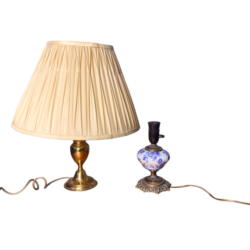 194 - A ceramic & gilt metal desk lamp, together with a Brass table lamp.