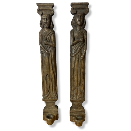 35 - A pair of composite wall candle sconces.