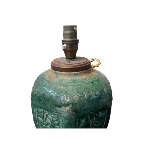 122 - A 19th-century Chinese Shiwan Ginger jar, converted to a table lamp. Nor drilled. 
23cm tall