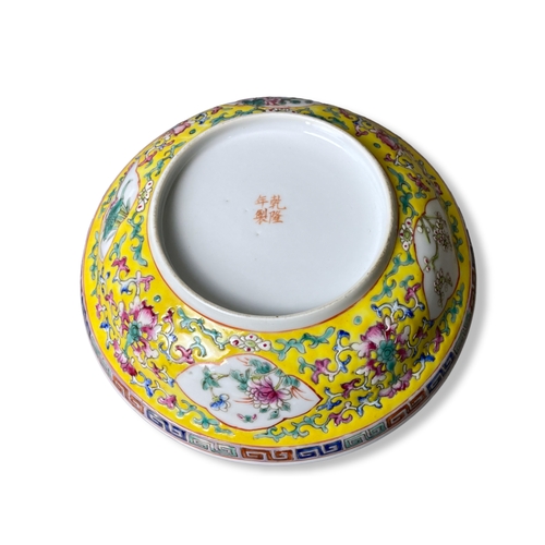 147 - A Chinese Famille Jaune porcelain Dish.  hand-painted enamels depicting stylised floral motif and Ca... 