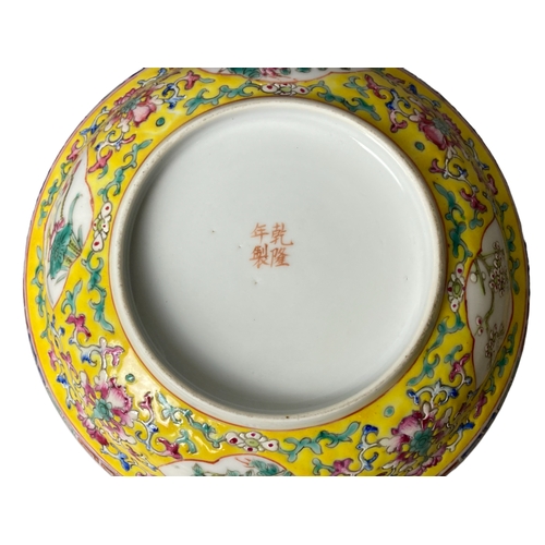 147 - A Chinese Famille Jaune porcelain Dish.  hand-painted enamels depicting stylised floral motif and Ca... 