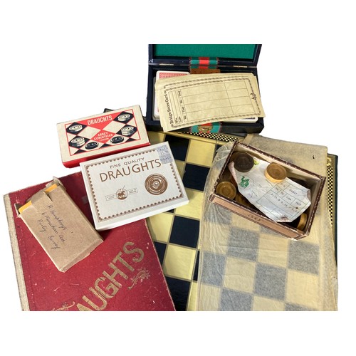 16 - A collection of Vintage board games & playing cards.