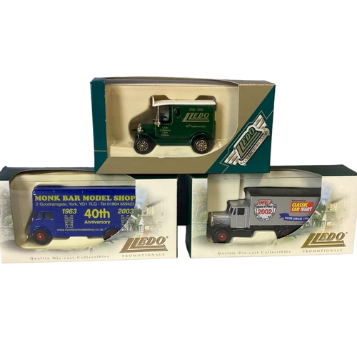 33 - A collection of boxed Diecast model buses. Including Lledo & Corgi.