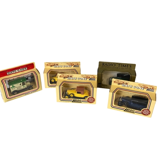 33 - A collection of boxed Diecast model buses. Including Lledo & Corgi.