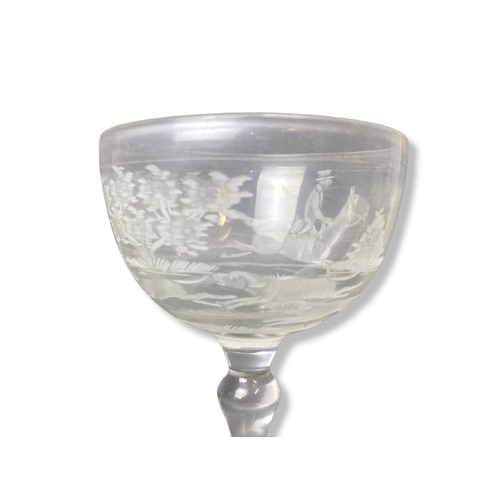 27 - A Georgian engraved Hunt scene wine glass, together with a hand-blown crackle wine glass.