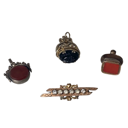 9 - Three antique pocket watch Fobs and Brooch. Including a hallmarked Silver and Carnelian & Agate swiv... 