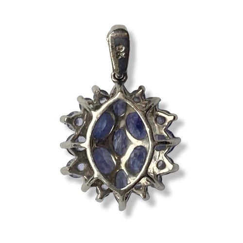 14 - A 9 Carat white Gold and Tanzanite pendant.
Measures 20 x 12mm.
Gross weight - 1.64 grams
