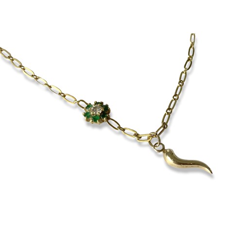 15 - An 18Ct Gold, Diamond & Emerald necklace and pendant. A central flower shape pendant, with a round-c... 