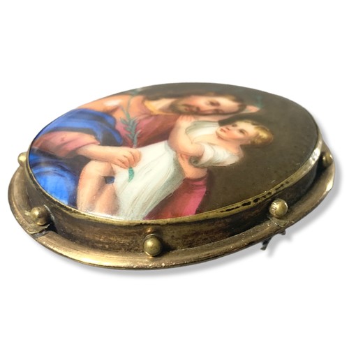 12 - A 19th-century Continental hand painted porcelain and yellow metal brooch. Hand-Painted.
55 x 46mm