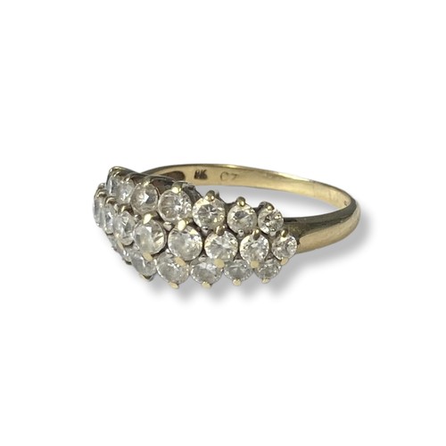 10 - A ladies 9Ct Gold & CZ ring. Set with rows of numerous graduating CZ's.
Size N
Weight - 2.69g