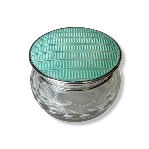 22 - An Art Deco Silver & green Guilloche powder box. With a Cut glass bowl. Silver hallmarks for Birming... 