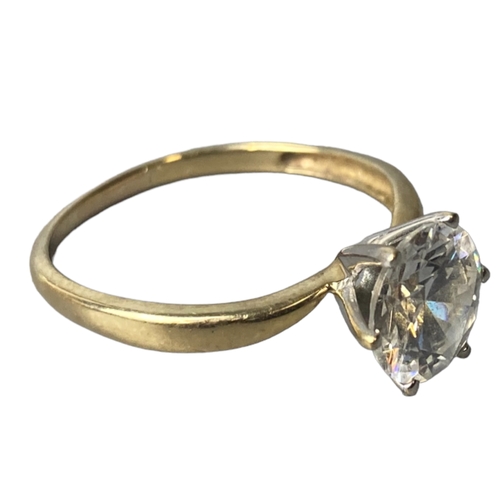 8 - Unmarked yellow metal engagement ring, together with a Silver brooch.
