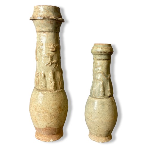 181 - Two Chinese Southern Song Funerary Jars. Qingbai glazed.
30 and 23cm tall.