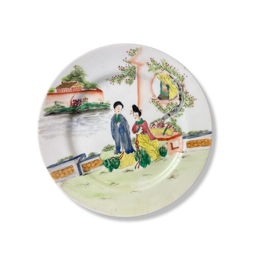 182 - A Chinese porcelain Famille rose dish. Depicting two woman in a courtyard scene. 
23cm Diameter