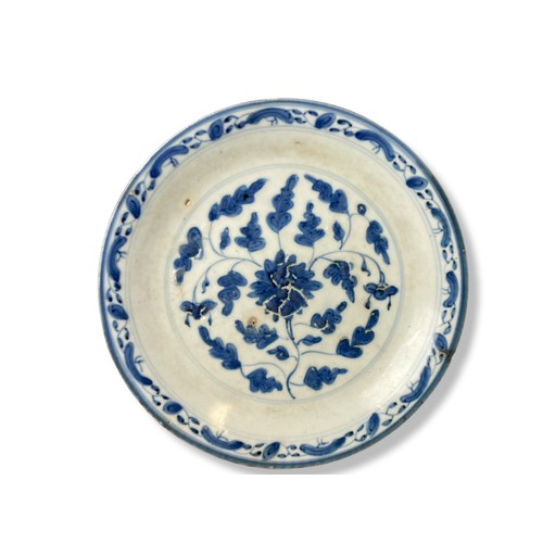 188 - An 18th century Chinese porcelain dish. Blue & white painted floral pattern. Seal mark to base. 
21c... 