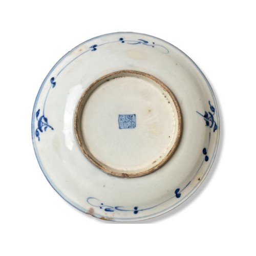 188 - An 18th century Chinese porcelain dish. Blue & white painted floral pattern. Seal mark to base. 
21c... 