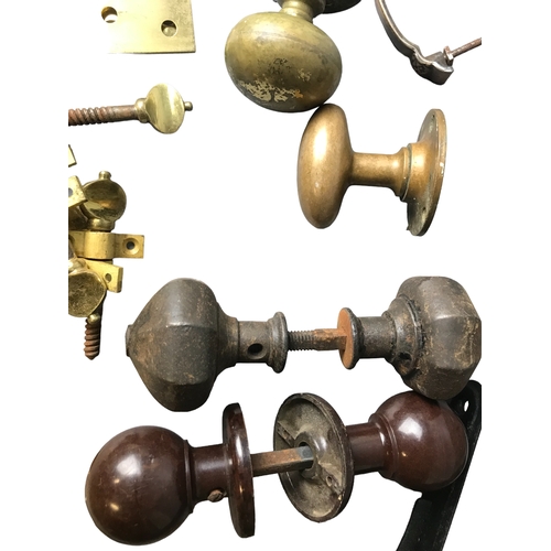 157 - A large collection of Brass and other Door knobs and locks etc, including Bakelite