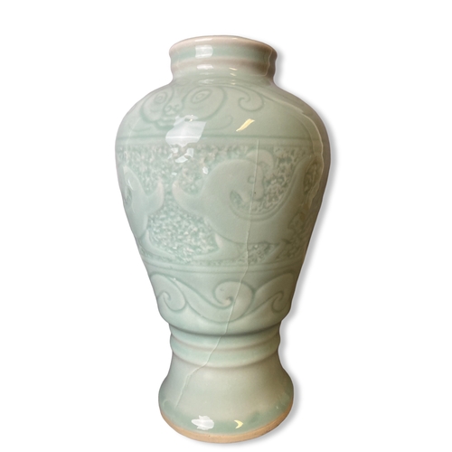 180B - A collection of Chinese porcelain. Including a Celadon vase, Opium pillow, Yixing teapot and rice pa... 