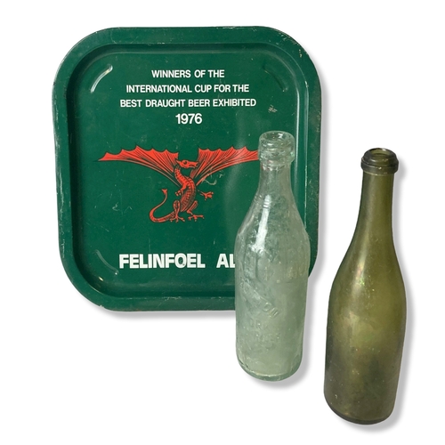 29A - 1976 Filinfoel Ales Tray with two antique glass bottles.