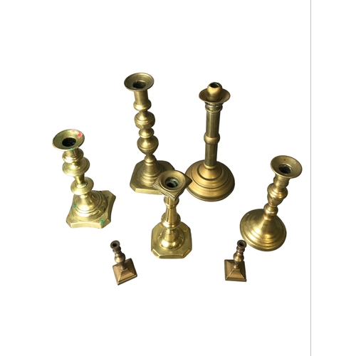 95 - A collection of Victorian and later Brass candlesticks