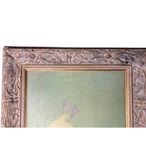 104 - A large Art Nouveau painting with carved wooden frame.