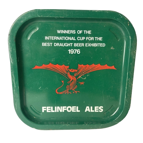 128 - 1976 Filinfoel Ales Tray with two antique glass bottles.