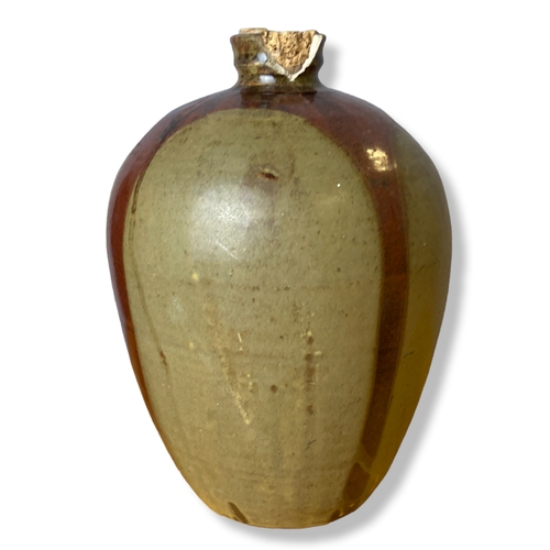 141 - A large Studio pottery vase, together with a carved cocnut.