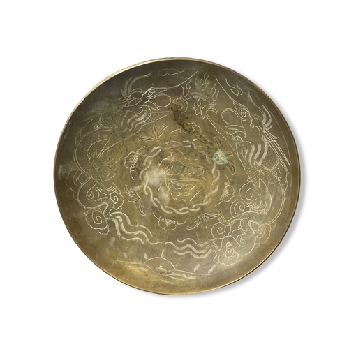 145 - Three Chinese engraved Brass bowls.