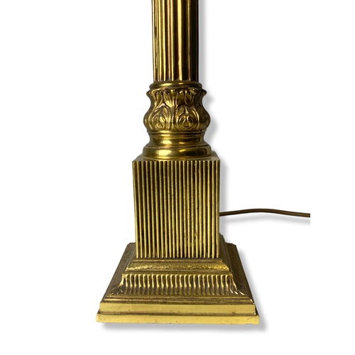 149 - A large Brass Corinthian Column table lamp.
54cm Tall