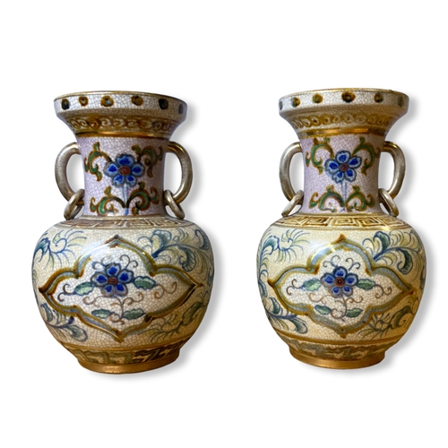 163 - A large pair of signed Japanese Satsuma vases. Crackle ground with painted stylised floral design.