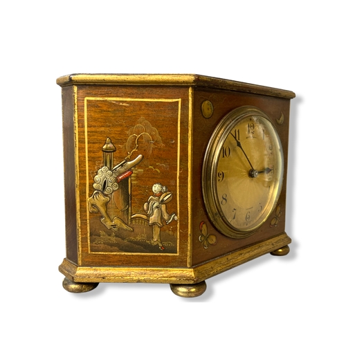 167 - An early 20th-century Chinoiserie mantle clock. French movement. Silver & gilt relief painted in Chi... 