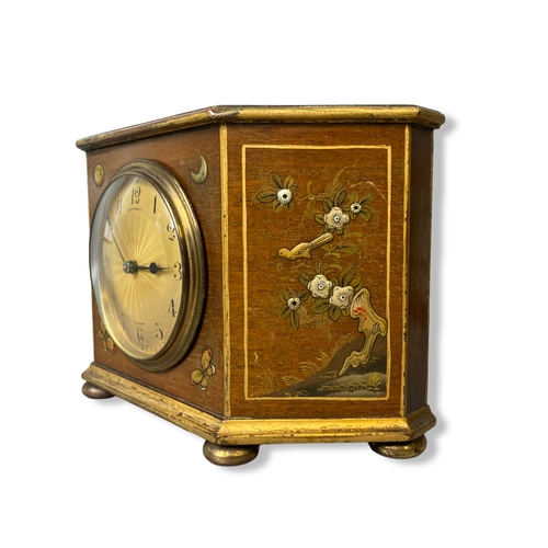 167 - An early 20th-century Chinoiserie mantle clock. French movement. Silver & gilt relief painted in Chi... 