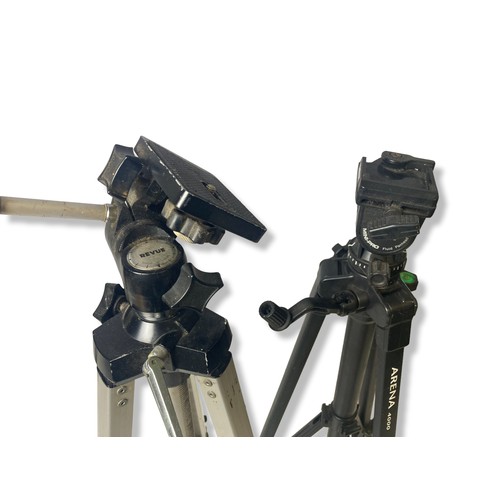 194 - Two camera tripods. Including Velbont and Revue.