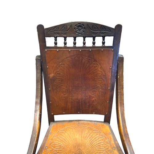 209 - Early 20th-century Luterma carved & embossed chair.