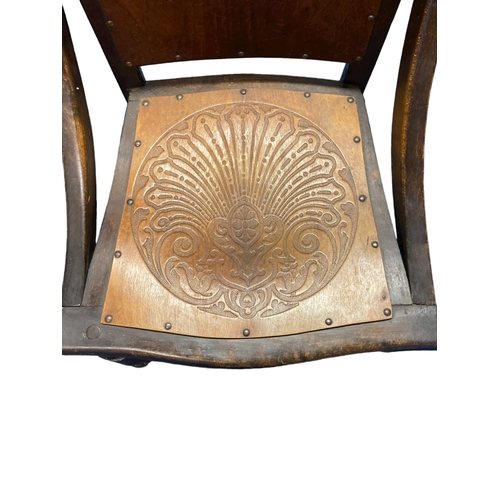 209 - Early 20th-century Luterma carved & embossed chair.