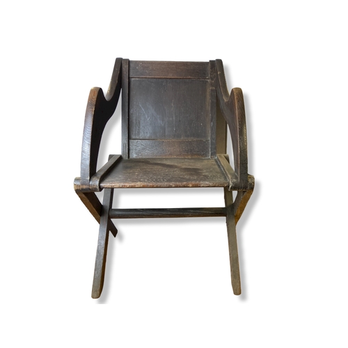 211 - Antique dark Oak Glastonbury chair.