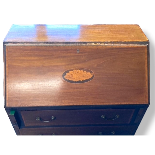 218 - A vintage Inlaid Writing bureau. With fitted interior and drawers.