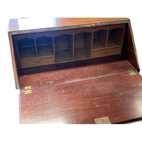 218 - A vintage Inlaid Writing bureau. With fitted interior and drawers.