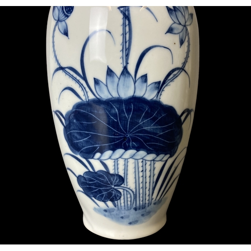 182 - A pair of Chinese porcelain hand painted vases. painted with pond Lilies.