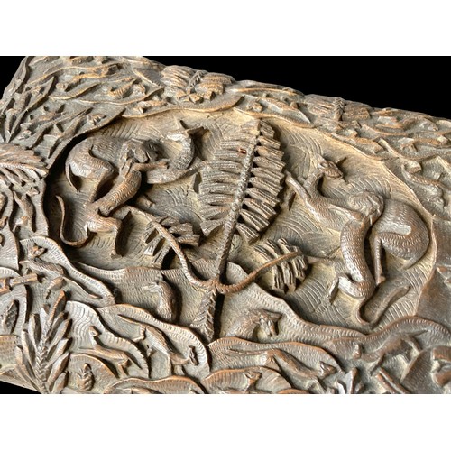 91 - A 19th-century carved Anglo Indian Sandalwood box. Elaborate hand carved Hunt scene with central sce... 