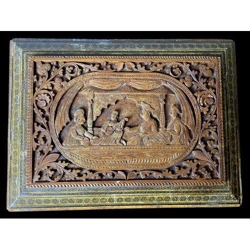 92 - A 19th-century Anglo Indian carved Sadeli box. Central scene depicting musicians playing for notabil... 