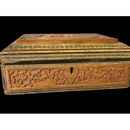 92 - A 19th-century Anglo Indian carved Sadeli box. Central scene depicting musicians playing for notabil... 