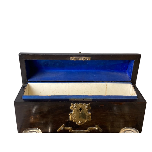 93 - Victorian Coromandel Desk stand with Inkwells and lidded letter box. With brass mounts.
30 x 24 cm