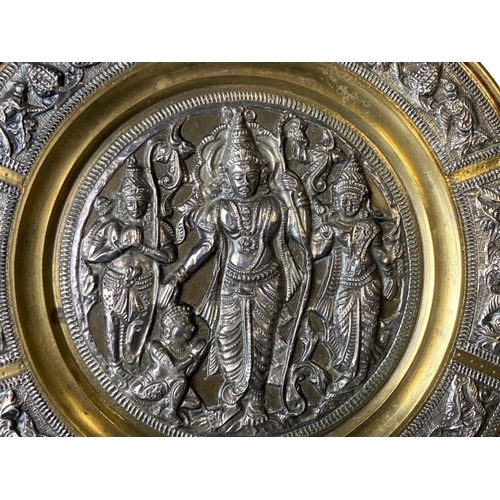 126 - Indian Silver & Brass embossed plate.
17cm Diameter